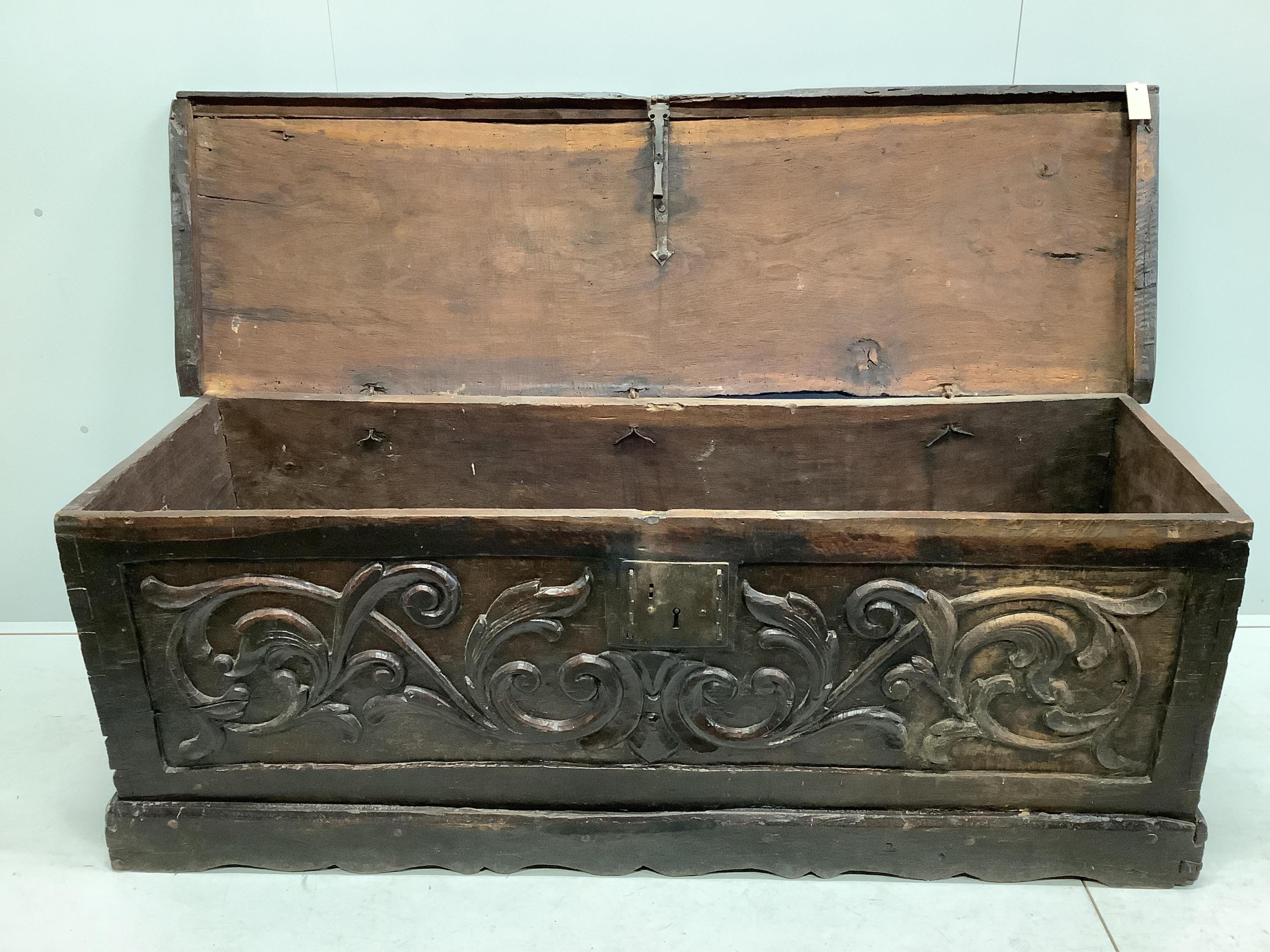 An 18th century Spanish oak coffer, width 172cm, depth 54cm, height 65cm. Condition - poor to fair